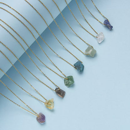 Crystal Raw Stone Necklaces. Handcrafted with natural stones like Amethyst, Citrine, and Lapis Lazuli for style and wellness.