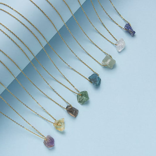 Crystal Raw Stone Necklaces. Handcrafted with natural stones like Amethyst, Citrine, and Lapis Lazuli for style and wellness.